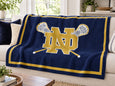 The Notre Dame Crossed Sticks Lacrosse Blanket