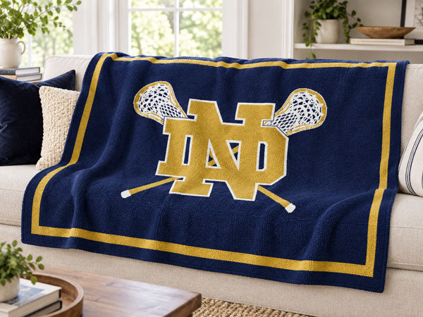 The Notre Dame Crossed Sticks Lacrosse Blanket