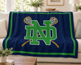 The Notre Dame Crossed Sticks Lacrosse Blanket